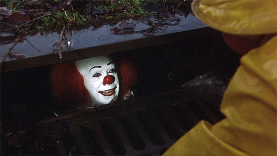 Tim Curry as Pennywise the Clown promises little Georgie that "everything floats down here."