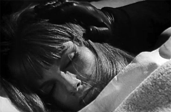 Melissa (Agnès Spaak) is visited at night by the walking corpse of her dead father.