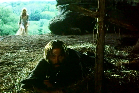 Ambrosio, in exile, is visited by the sorceress Mathilde (Nathalie Delon).