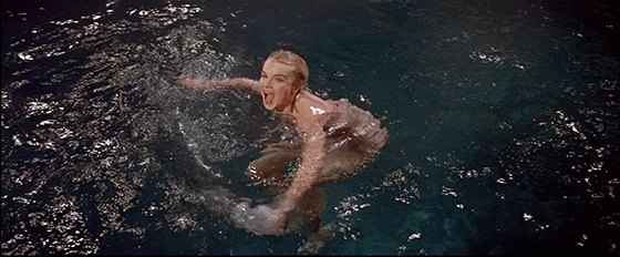 Altaira (Anne Francis) takes a swim.