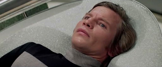 Michael York as Logan.