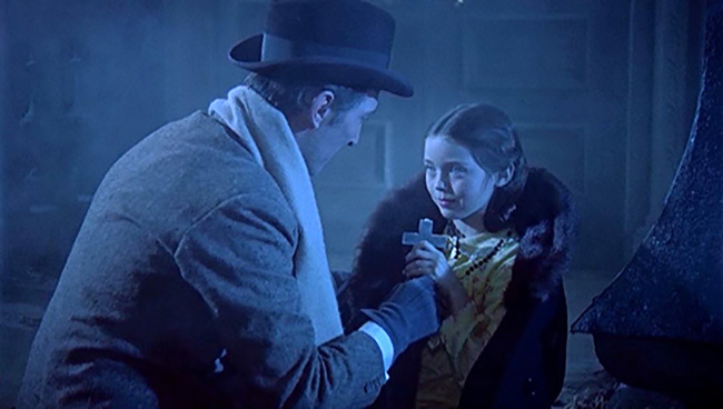 Van Helsing comforts Tania (Janine Faye) in a graveyard stalked by a vampire.