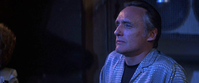 Frank Booth (Dennis Hopper) watches Dorothy perform "Blue Velvet" at the Slow Club.