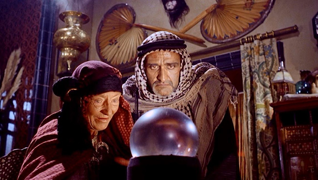 Fortune teller Haiti (Catherine Lacey) and her son Hasmid (Roger Delgado) plot against the raiders of a Pharaoh's tomb.