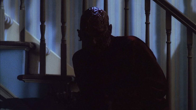 Freddy Krueger (Robert Englund) stalks Nancy in her home. Wes Craven seldom gives us a clear look at Freddy outside of shadows.