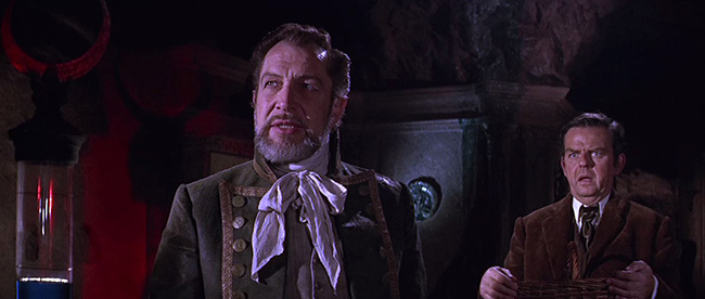 Sir Hugh (Vincent Price) shows the undersea city to Harold Tufnell-Jones (David Tomlinson).