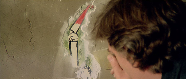 Hemmings uncovers a plastered-over child's drawing in an empty villa.