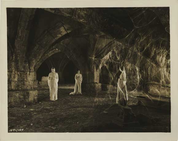 Publicity still of Dracula's wives in their crypt.