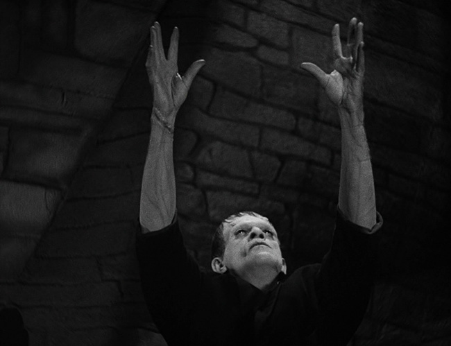 The monster (Boris Karloff) discovers sunlight.