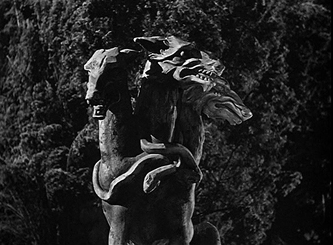 A statue of the three-headed dog of the Underworld, Cerberus, overlooks the pier on the Isle of the Dead.