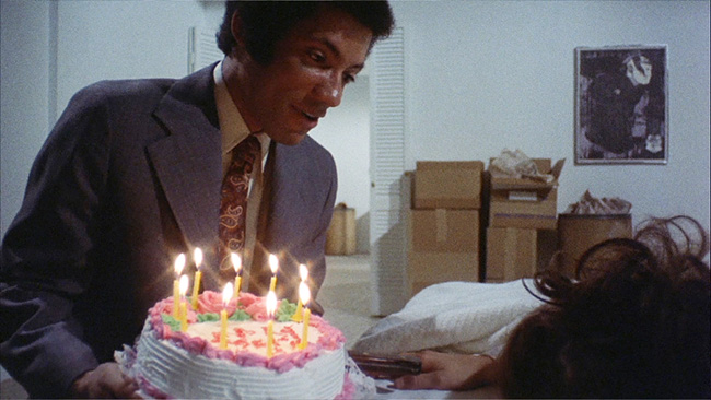 Phillip (Lisle Wilson) delivers a birthday cake to Danielle (Margot Kidder). Or is it Dominique?