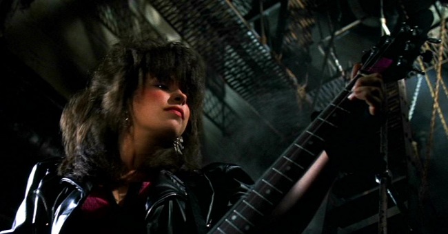 Rocker J.J. (Saffron Henderson) dreams of electric sheep.