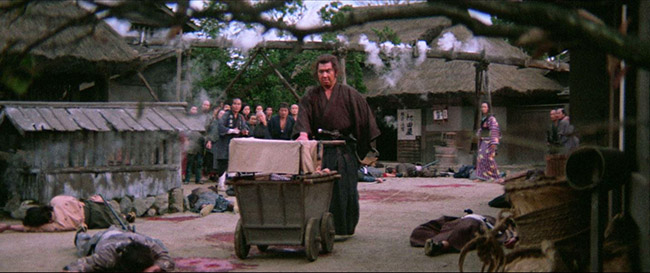 In "Lone Wolf and Cub: Sword of Vengeance," Itto Ogami (Tomisaburo Wakayama) pushes his baby cart down a road of bloody death.